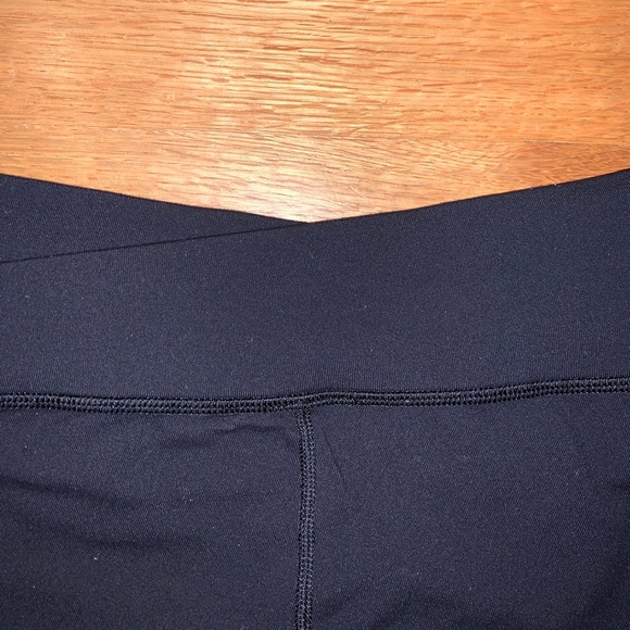 Black Lululemon athletic shorts. - Picture 6 of 7